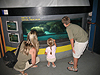 Jordan, Tyler, and Tanya looking at the giant turtles