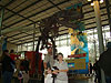 Jordan, Ken, and Tyler in front of a T-Rex skeleton 