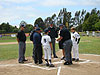 Tyler and a player from Rincon Valley talking the the umpires