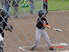 Tyler swings and hits
