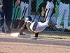 The cropped picture of Tyler diving back to first