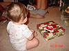 Jordan getting ready to open a gift from Heidi and Dave