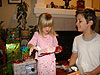 Jordan and Tyler opening their Christmas gifts