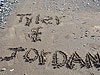 Tyler's and Jordan's name in the sand