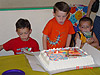 Destry blowing out his candles