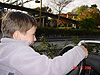 Tyler driving the car in Autopia