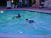 Tyler and Ken swimming in our hotel pool