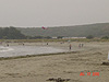 Ken flying the kite on the beach