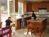 The kids playing in the kitchen