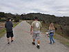 Another picture of Ken, Tyler, and Jordan walking with Shelby