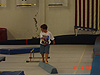 Tyler walking on a balance beam