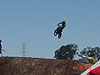 One of the riders going over a jump