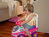 Jordan riding one of her new toys