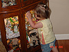 Jordan checking out the curio cabinet