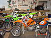 Tyler's new Kawasaki and his old KTM