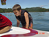Tyler climbing into the boat