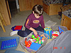 Tyler playing with some toys