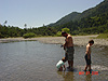 Ken, Jordan, and Tyler playing in the creek
