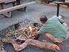 Ken building a fire