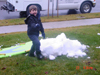 Tyler playing in the snow on our front yard