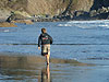 Tyler running on the beach