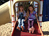 Jordan and Paris having fun on the roller slide