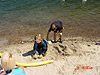 Kara and Tyler building a sand castle
