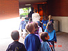 Mrs. Solheim leading the kids into the building