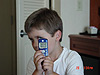 Tyler showing off his new cell phone in our hotel room