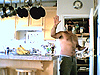 Ken waving in the kitchen