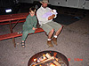 Tyler, Ken, and Jordan by the campfire