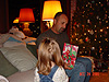 Ken helping Jordan open her gifts