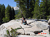 Tyler relaxing on a granite rock