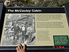 A sign for the McCauley Cabin